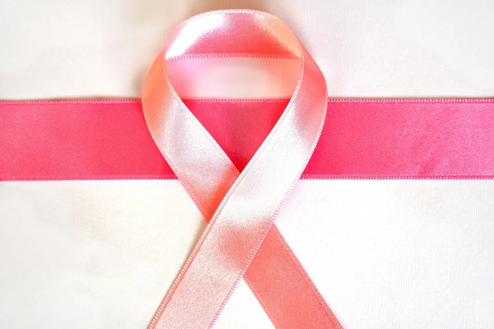 A pink ribbon, the symbol of breast cancer awareness